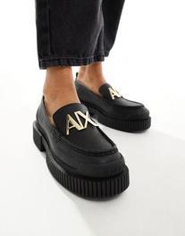 Oferta de Armani Exchange loafer in black por $190 en asos