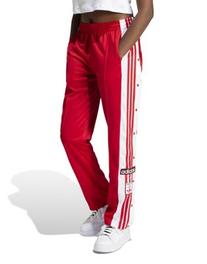 Oferta de Adidas Originals adibreak popper pants in red por $101,99 en asos
