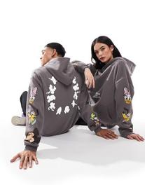 Oferta de ASOS DESIGN Disney unisex oversized hoodie in charcoal with multi Mickey Mouse and friends prints por $33,59 en asos