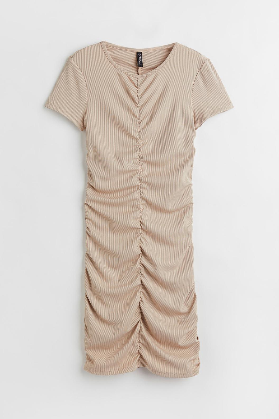 Oferta de Vestido drapeado de punto por $6600 en H&M